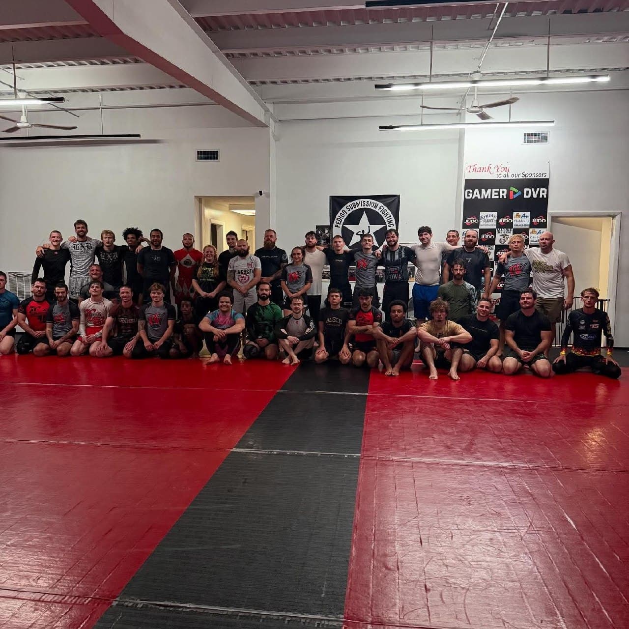 The Fort Wayne Submission Fighting team gathered on the mats after a class
